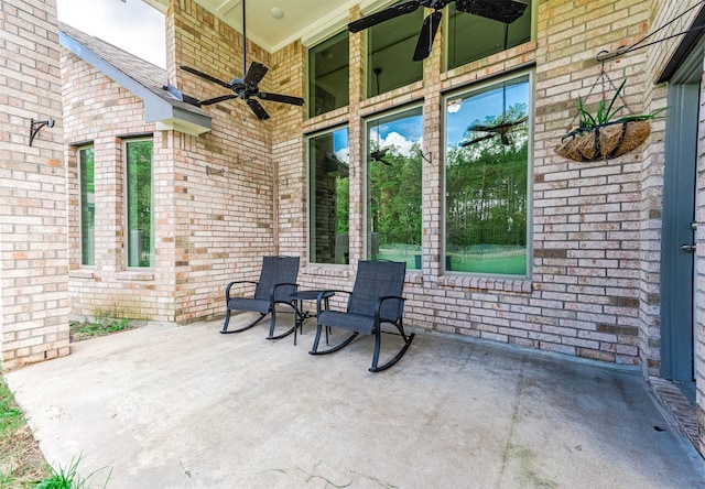 view of patio / terrace featuring ceiling fan