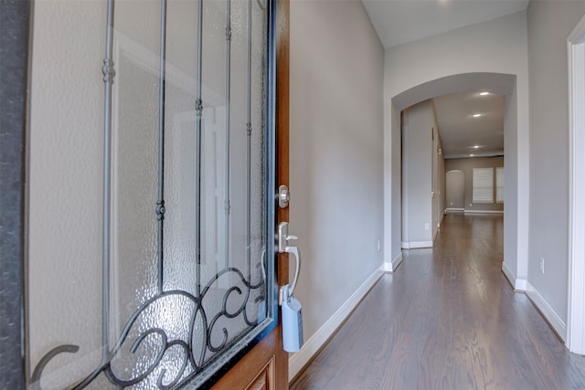 entrance foyer featuring dark hardwood / wood-style flooring