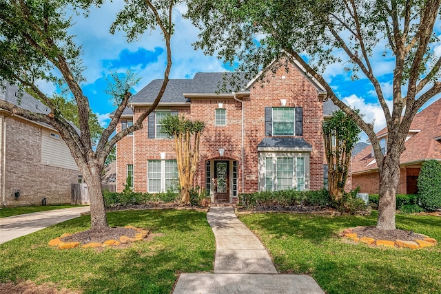 view of front of home with a front yard