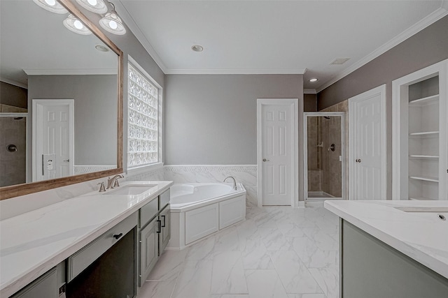 bathroom featuring vanity, independent shower and bath, and ornamental molding