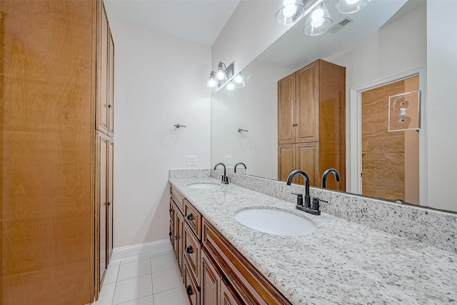 1810 Mccrary Rd, Richmond, TX 77406 - full bath with double vanity, tile patterned flooring, and baseboards