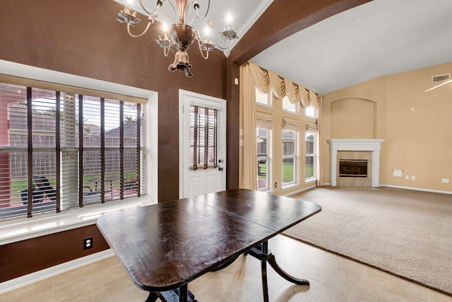 unfurnished dining area with a premium fireplace, a notable chandelier, light carpet, and lofted ceiling with beams