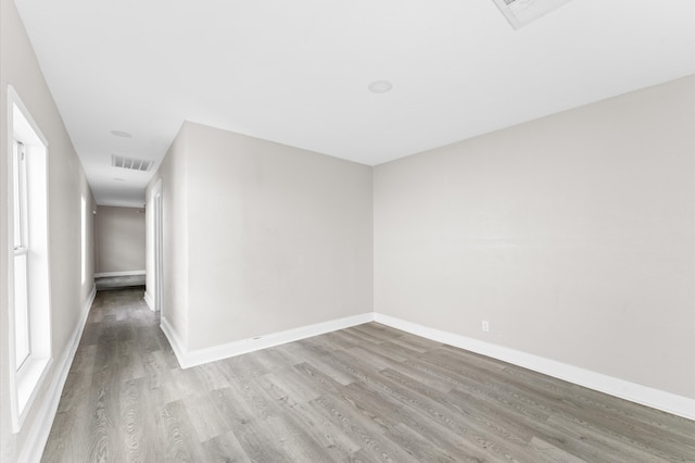 unfurnished room featuring light hardwood / wood-style flooring