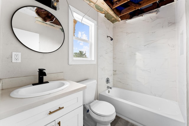 full bathroom featuring hardwood / wood-style flooring, vanity, toilet, and tiled shower / bath combo