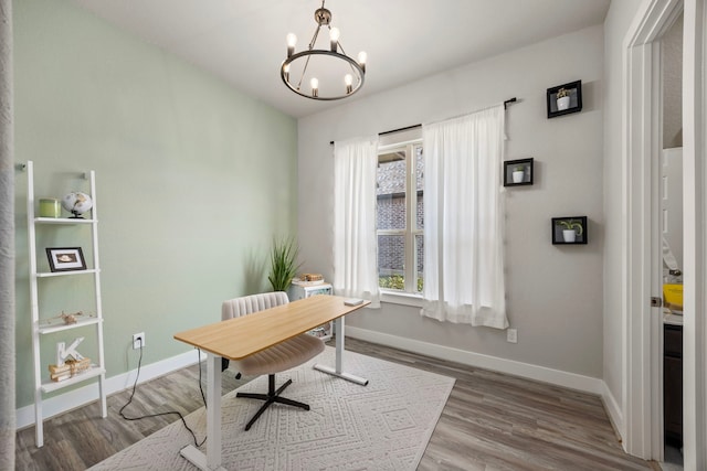 2215 Rose Manor Ct, Richmond, TX 77469 - office area with a chandelier, baseboards, and wood finished floors