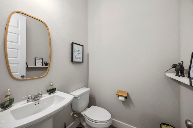 2215 Rose Manor Ct, Richmond, TX 77469 - half bathroom featuring a sink and toilet