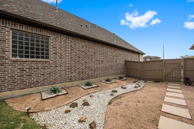 2215 Rose Manor Ct, Richmond, TX 77469 - view of yard with a gate