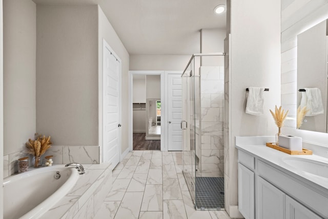 2215 Rose Manor Ct, Richmond, TX 77469 - full bath with vanity, a stall shower, a bath, marble finish flooring, and a closet