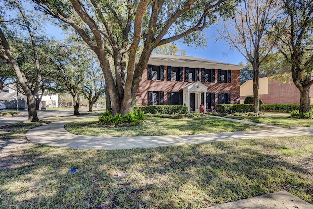 colonial house with a front yard