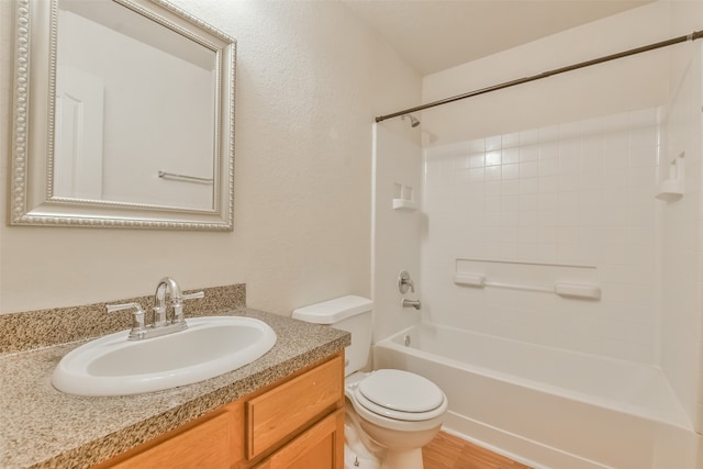 full bathroom with toilet, vanity, shower / bathtub combination, and wood-type flooring