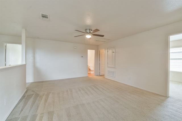 carpeted empty room with ceiling fan