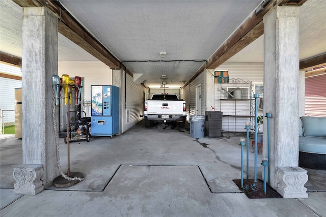 view of patio / terrace featuring a carport