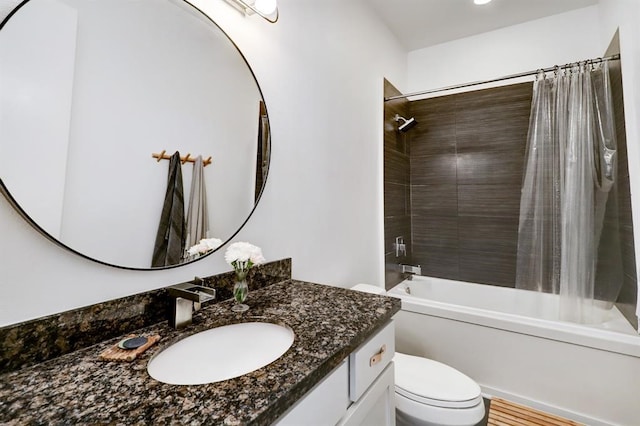 full bathroom with shower / bathtub combination with curtain, toilet, and vanity