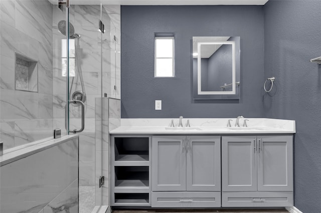 bathroom with vanity and an enclosed shower