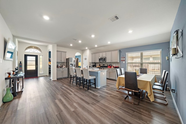 dining area with hardwood / wood-style floors