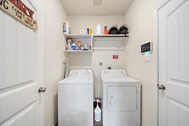 laundry room featuring washer and dryer