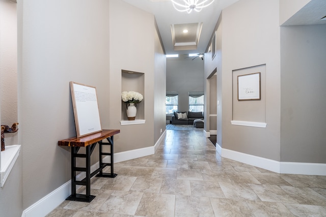 hallway with a towering ceiling