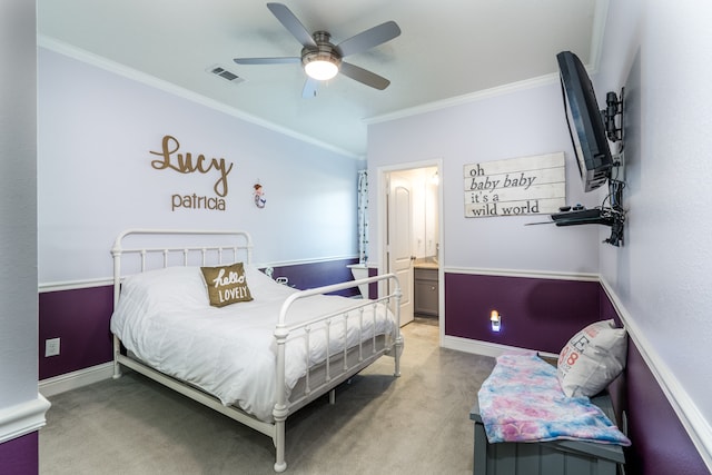 bedroom featuring carpet flooring, ceiling fan, ornamental molding, and connected bathroom