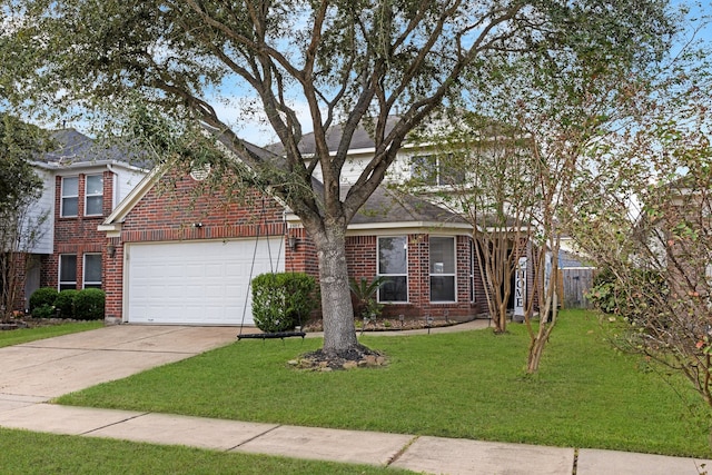 view of front of house featuring a garage and a front lawn