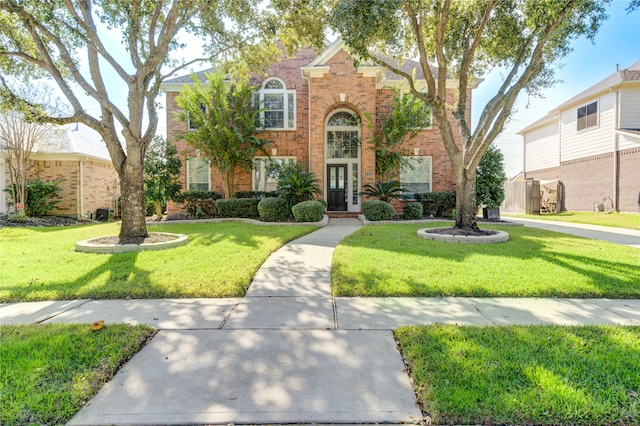 view of front of home with a front yard