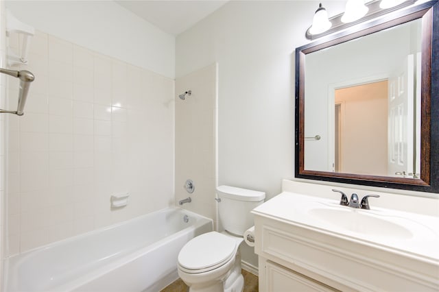 full bathroom with vanity, toilet, and tiled shower / bath