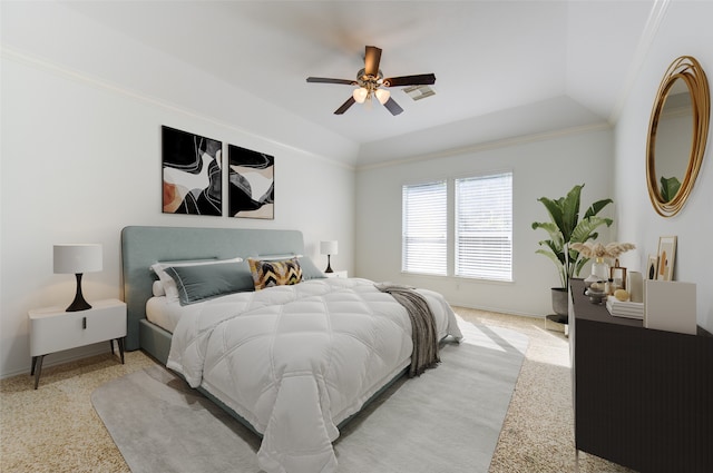 carpeted bedroom featuring ornamental molding, vaulted ceiling, and ceiling fan