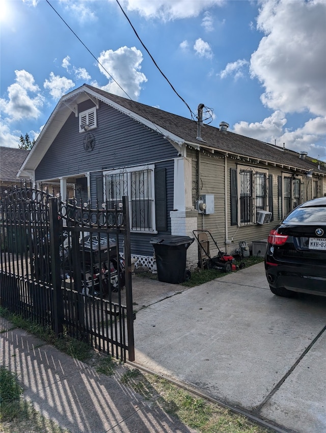 view of front of home featuring cooling unit