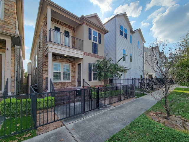 multi unit property featuring a balcony