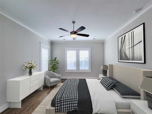 bedroom with crown molding, dark hardwood / wood-style floors, and ceiling fan