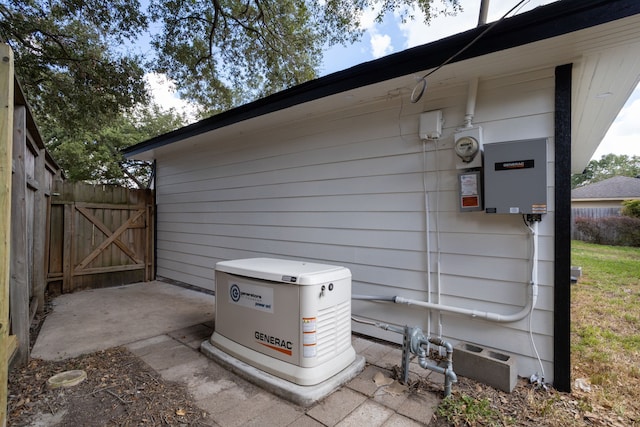 exterior details featuring wood walls and concrete floors