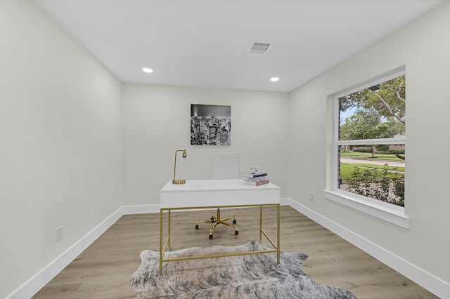 office space featuring light wood-type flooring