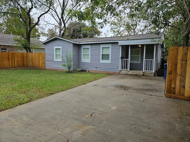 ranch-style house with a front lawn