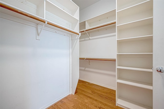 5031 Nolda St, Houston, TX 77007 - walk in closet with wood finished floors