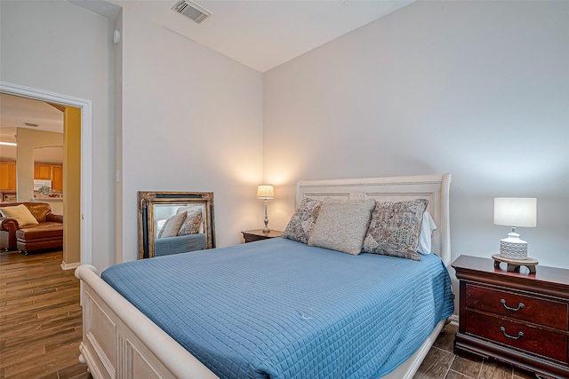 bedroom featuring dark hardwood / wood-style floors