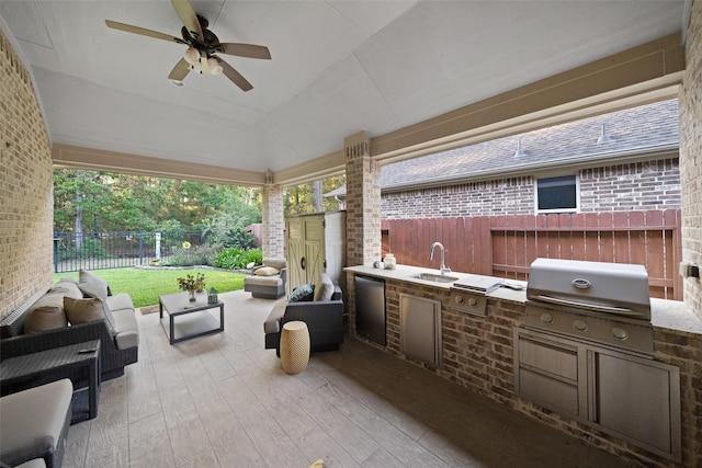 view of patio / terrace with an outdoor hangout area, ceiling fan, exterior kitchen, sink, and a grill