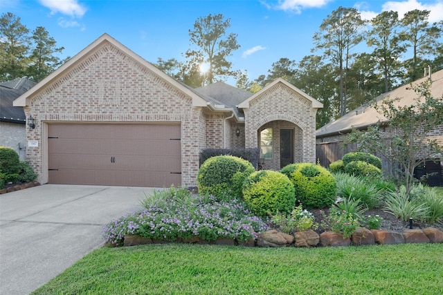 single story home with a garage