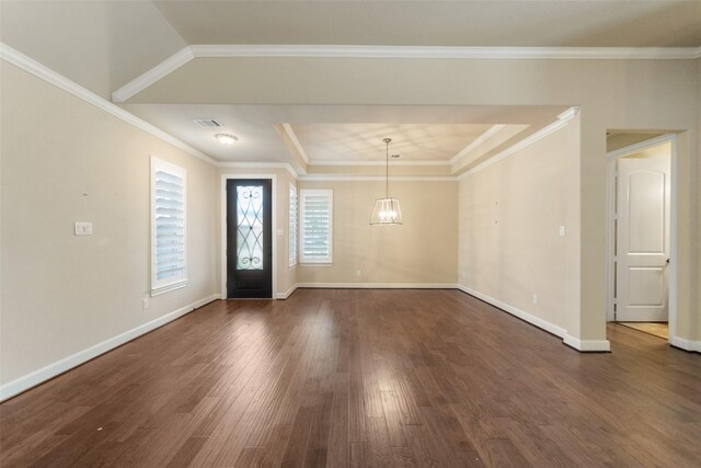 entrance foyer featuring crown molding and dark wood-type flooring