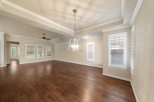 unfurnished dining area featuring vaulted ceiling, crown molding, dark wood-type flooring, and ceiling fan with notable chandelier