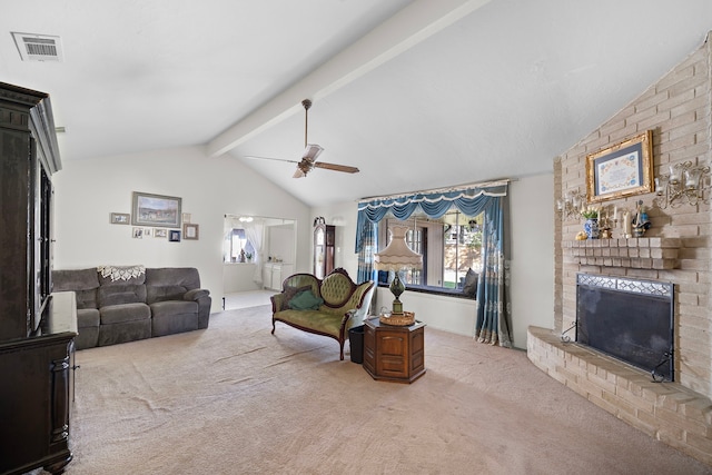 carpeted living room with vaulted ceiling with beams, ceiling fan, and a fireplace