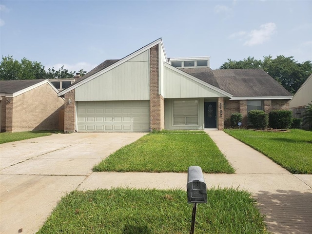 mid-century modern home with concrete driveway, brick siding, an attached garage, and a front lawn