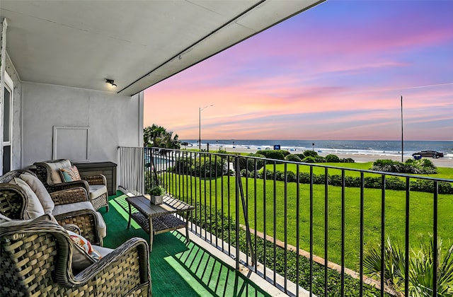 balcony at dusk with a water view