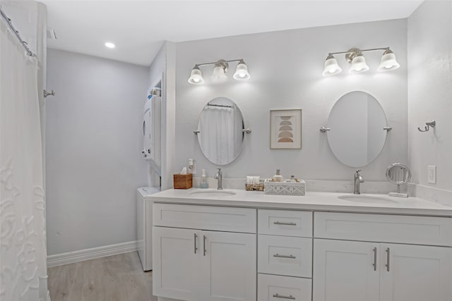 bathroom featuring hardwood / wood-style floors and vanity