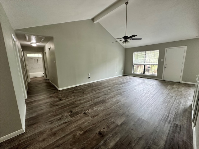 unfurnished living room with ceiling fan, dark hardwood / wood-style floors, and vaulted ceiling with beams