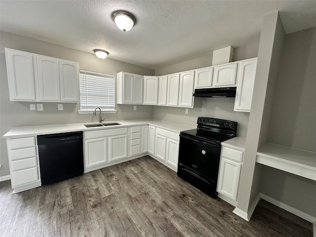 kitchen with white cabinets, black appliances, sink, and dark hardwood / wood-style floors