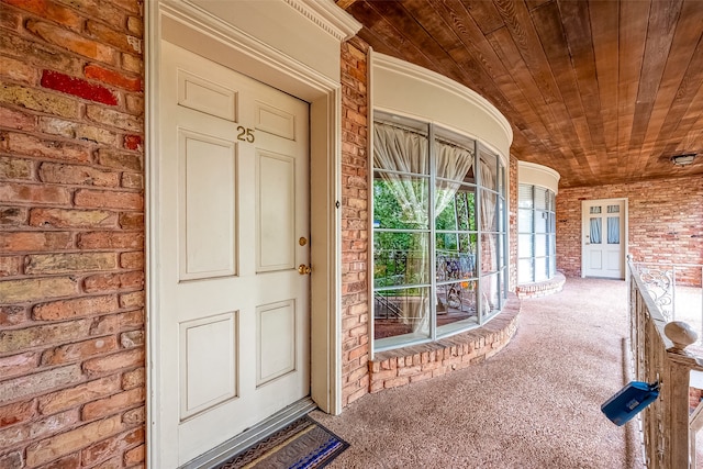 doorway to property with a porch