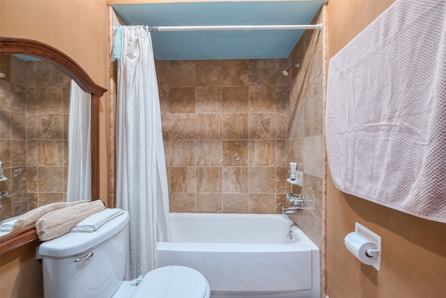 bathroom with toilet and shower / tub combo