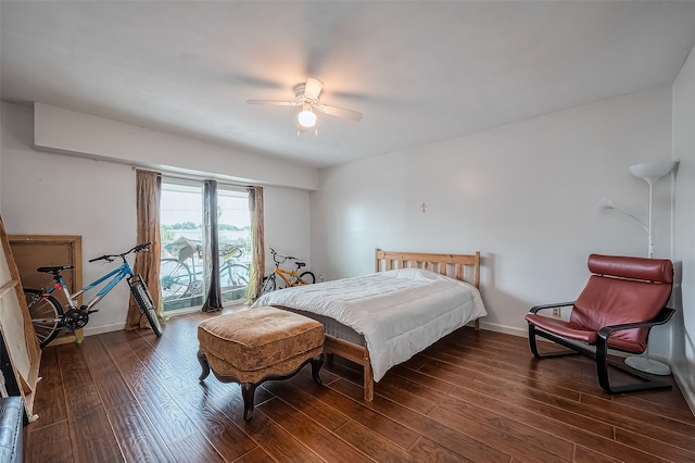 bedroom featuring ceiling fan and dark hardwood / wood-style flooring