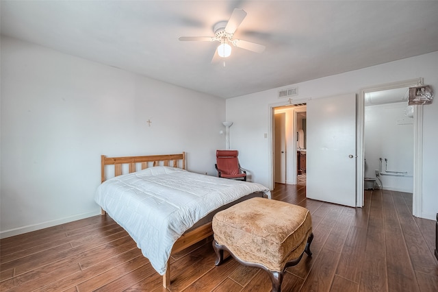 bedroom with dark wood-type flooring and ceiling fan