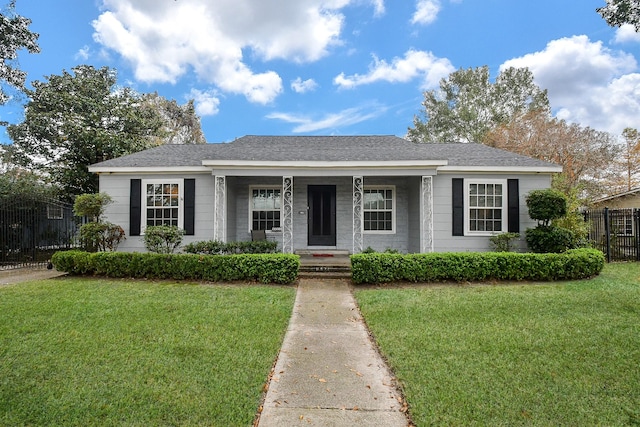 ranch-style home with a front yard