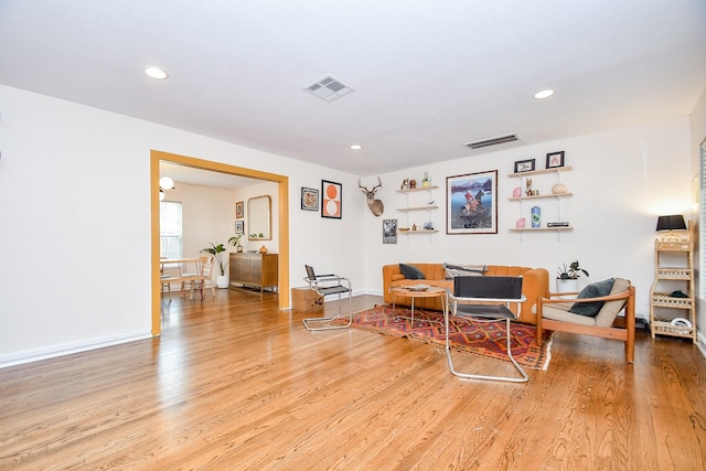 living area with light hardwood / wood-style floors